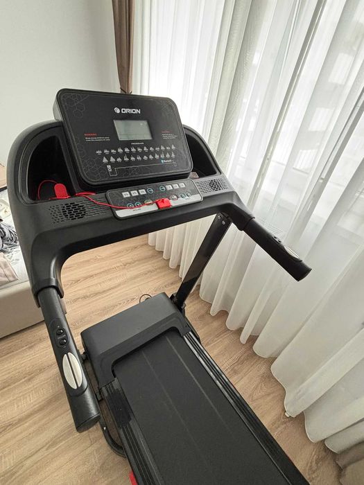 Banda de alergat Orion RUN M600, înclinare electrică, Bluetooth, stare foarte bună