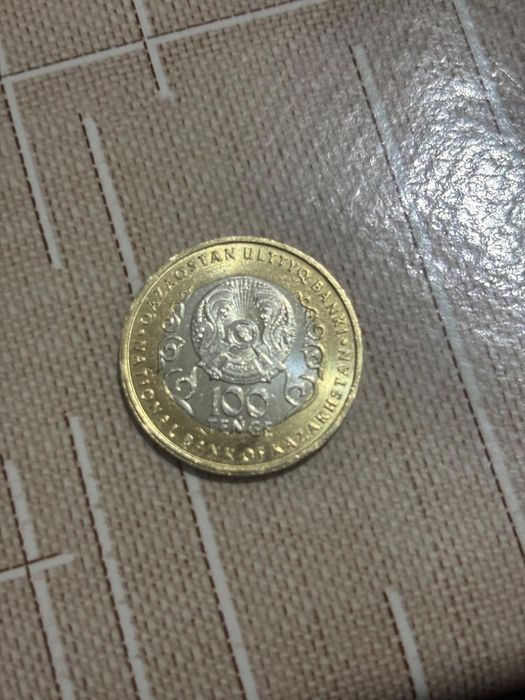 Продам монету 100тг