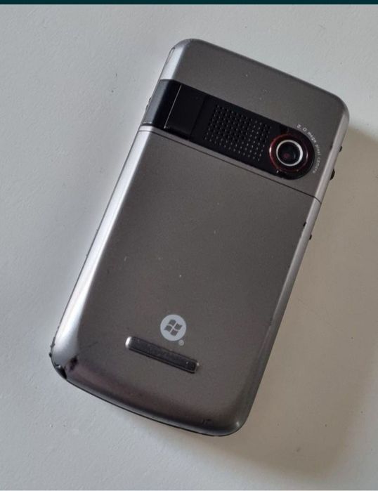 Telefon Asus cu încărcător