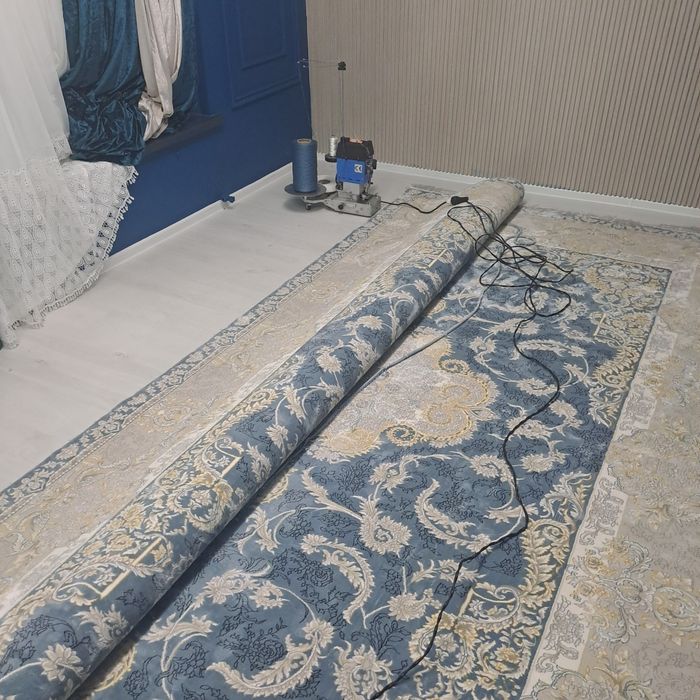 Gilam kesish va tikish