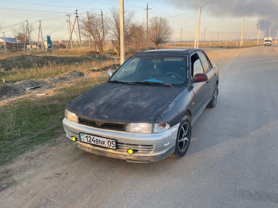 Машина Митсубиси Лансер