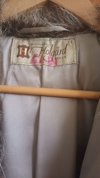 Haină de blana elegantă și nefolosită