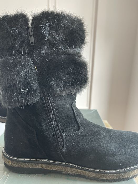 Продам унты зимние