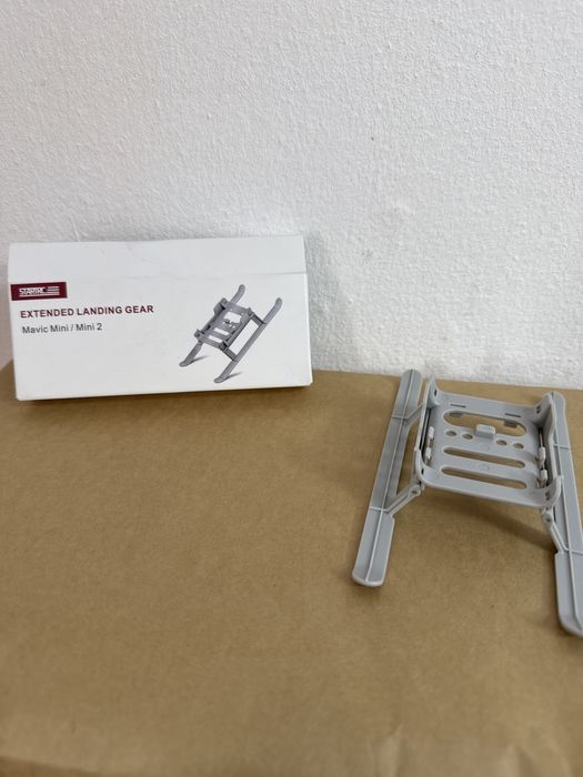 Suport de pus pe burta dronei