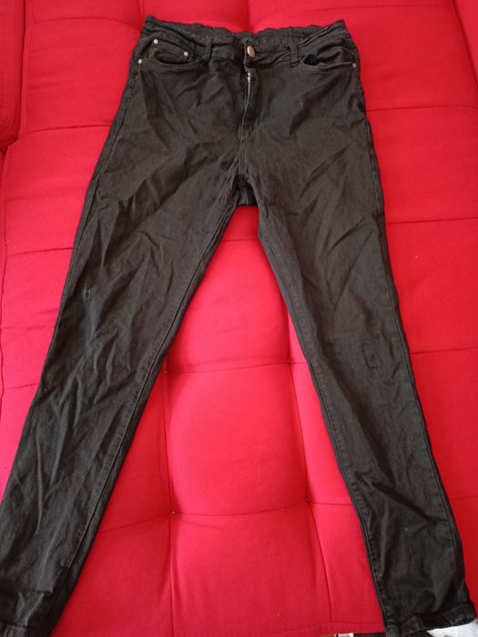 Blugi elastici cu buzunare