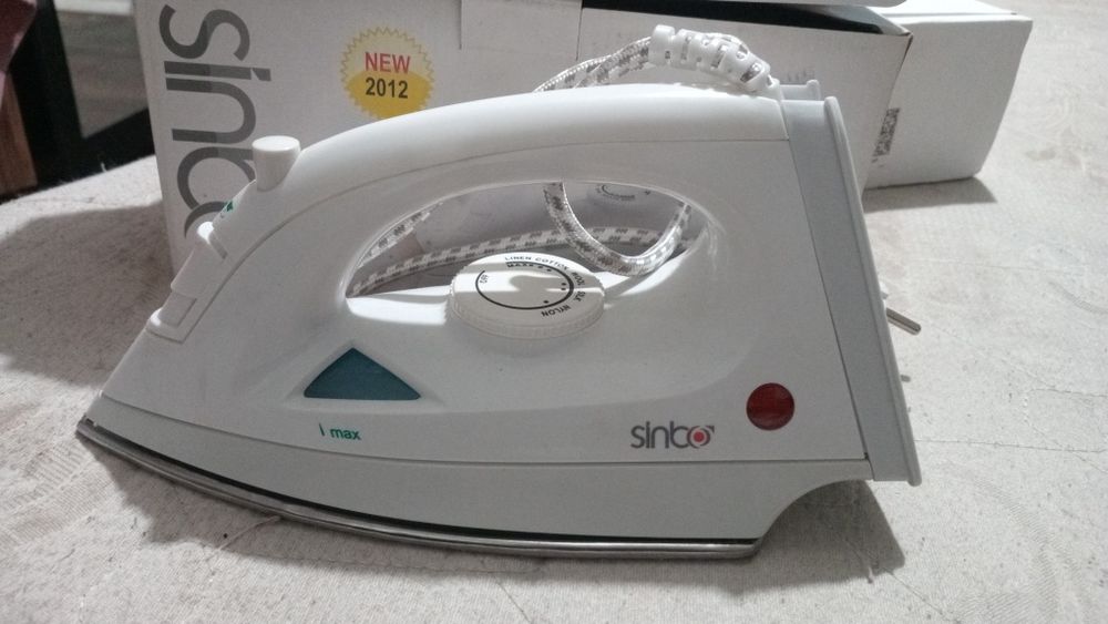 Продам утюг б/у фирма sinbo