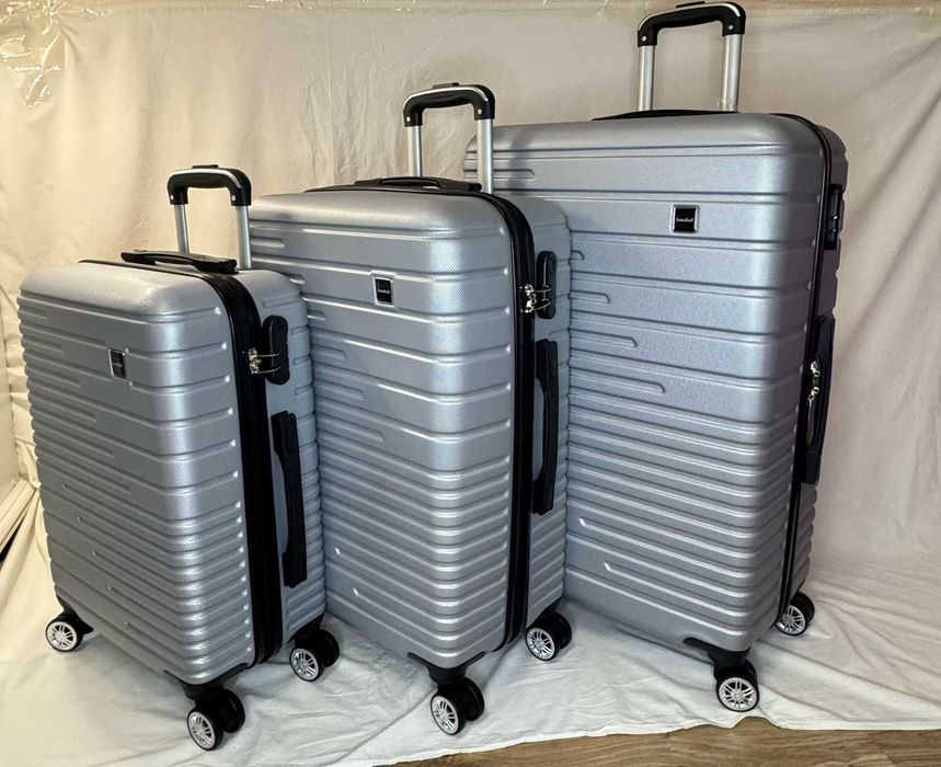 Продам чемодан на колёсиках разных размеров