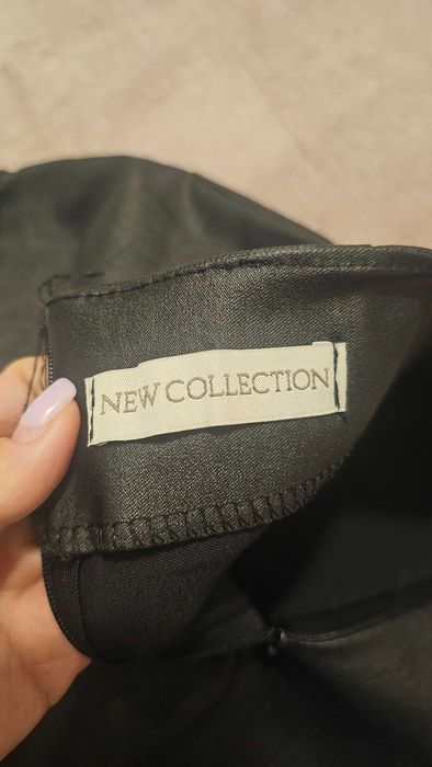 Pantaloni negri scurti din piele