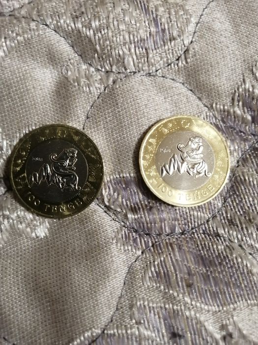 Монета номиналом 100 тенге с барсом