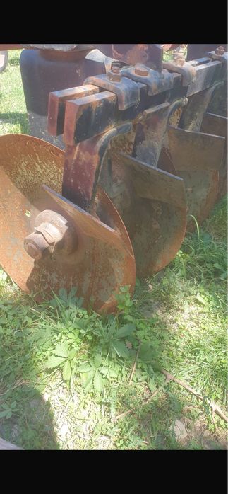 Disc agricol in V