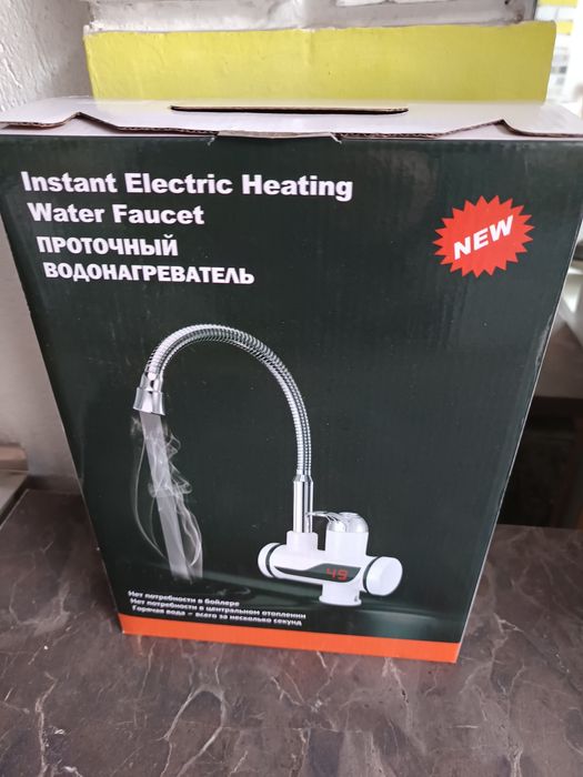 Нов смесител с нагревател за кухня