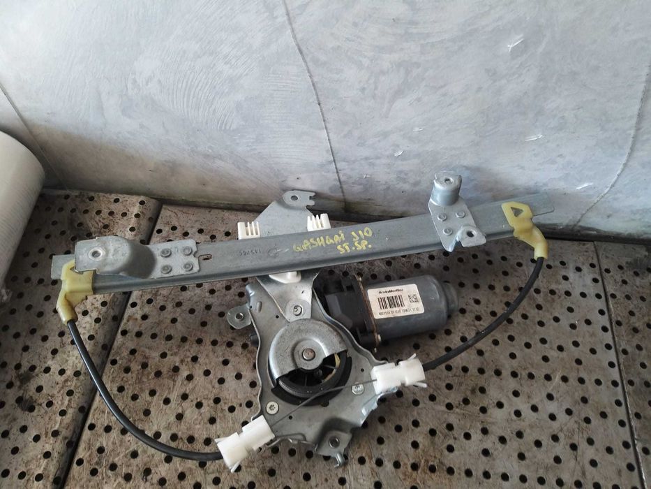 Macara cu motoras stanga spate nissan qashqai j10 402191a