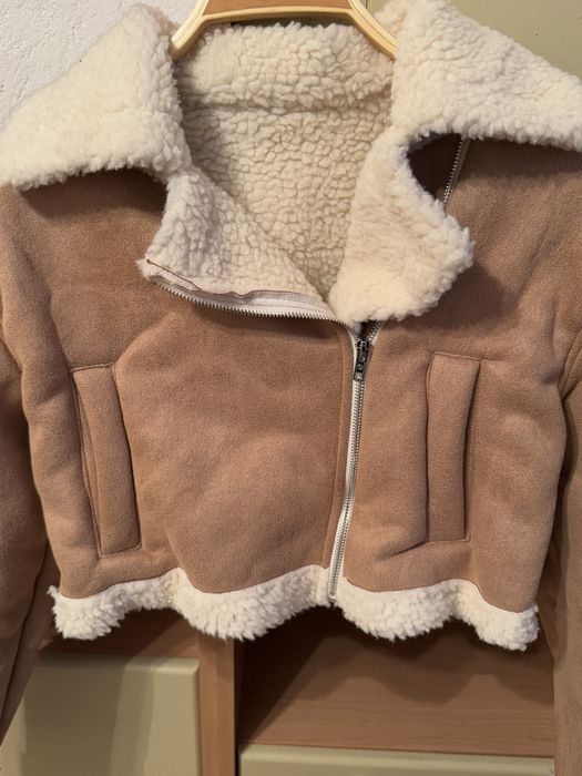 Преходно кафяво яке