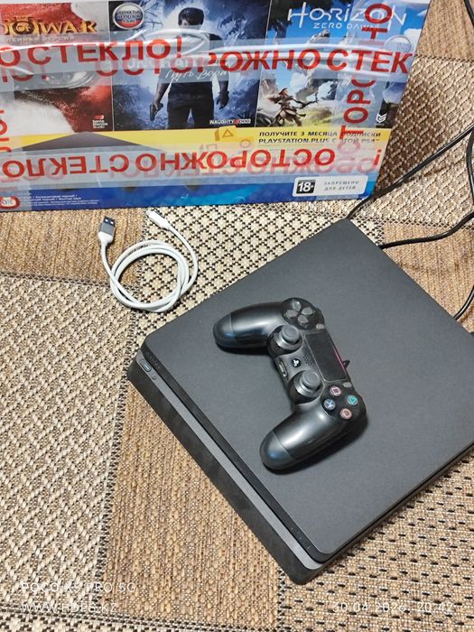 PlayStation 4 Slim 1TB + 700 игр