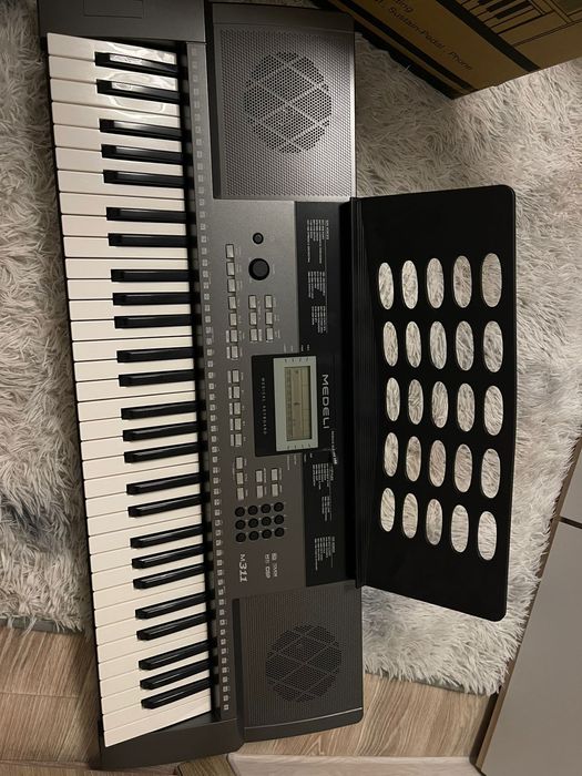 Синтезатор  medeli