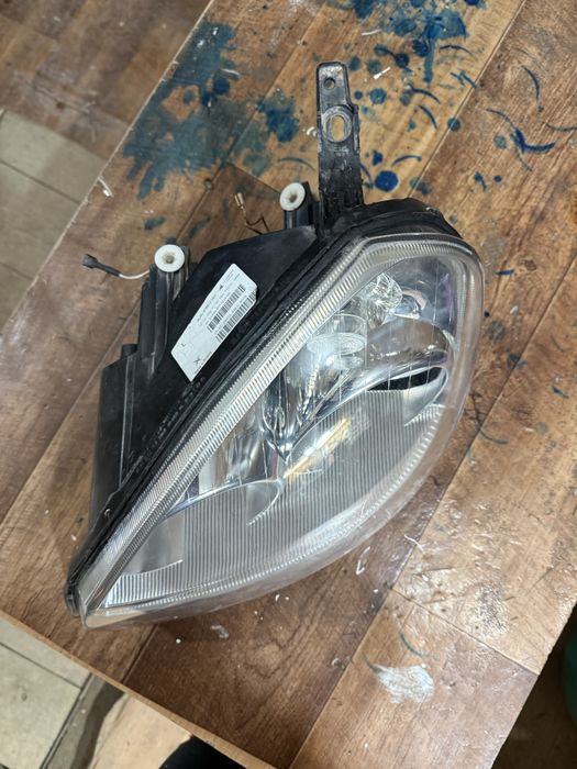 Фара приора 1 левая оригинал бош