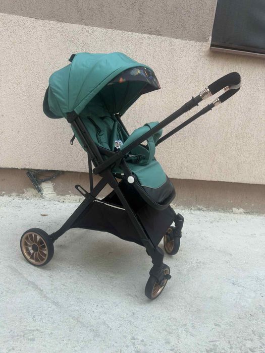 Carucior sport cu pozitie de somn si mâner reversibil, tip troller