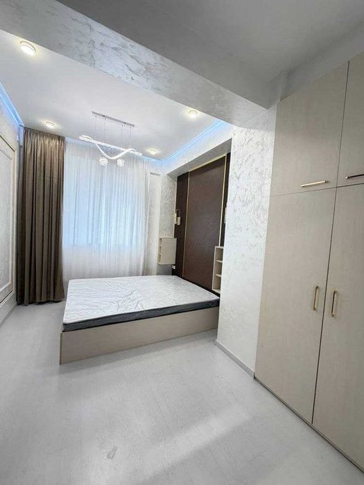 V4975 ПРОДАЕТСЯ 2/1/11 НОВОСТРОЙКА  на: Юнусабад круг квартал-8