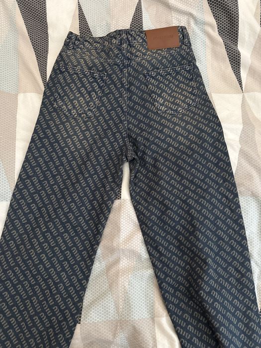 Отигинални женски дънки MIU MIU