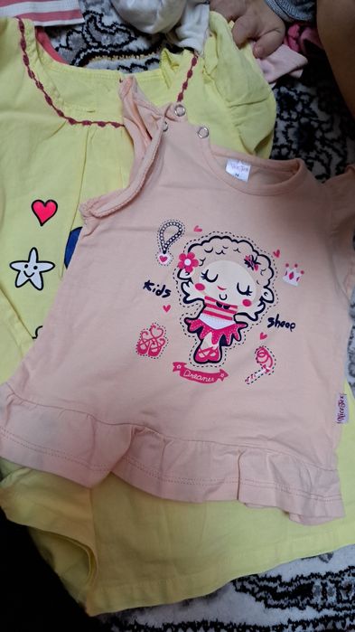 Новорождённого одежды на девочку