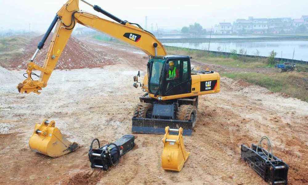 Колесный экскаватор CAT [M320] 1.19м³