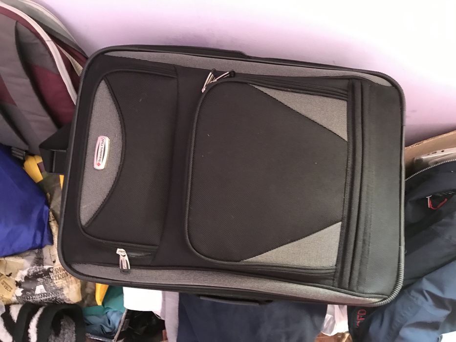Ruxac laptop si troler voiaj