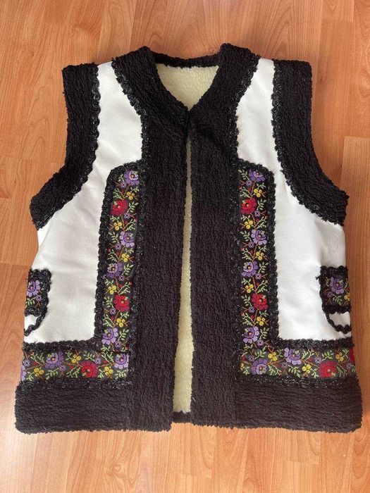 O să vând o vestă. cu ridicata si cu amanuntul