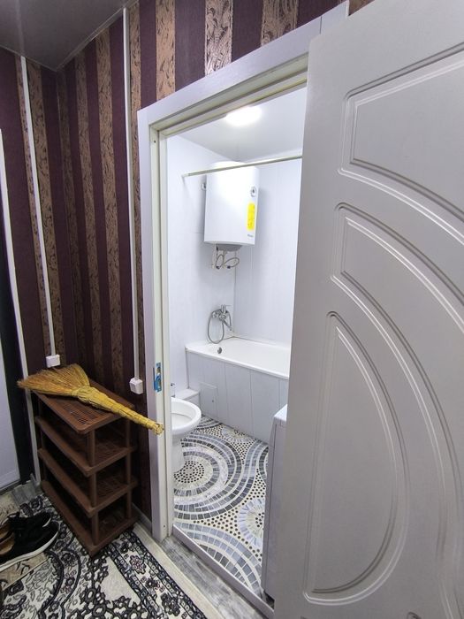 Сергели Спутнике. Двух комнатная квартира с ремонтом в деревянном доме