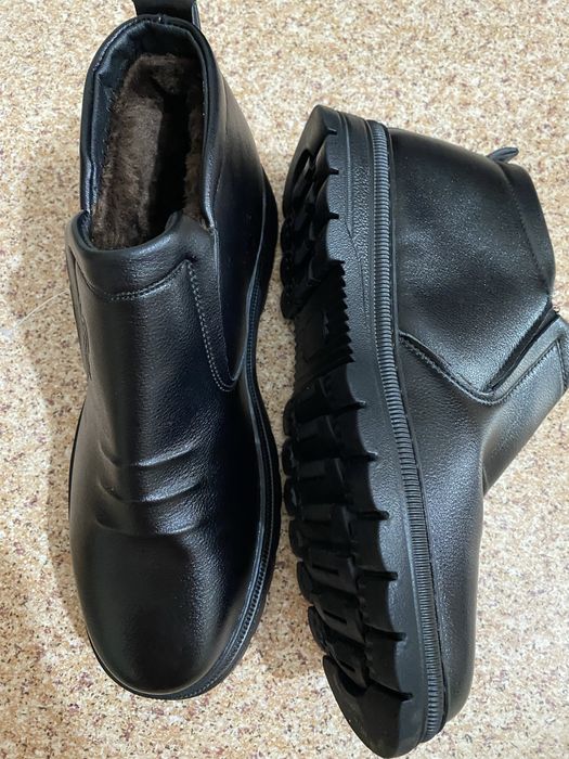 Безторг .  Новые  весенние  мужские  сапоги   продам .