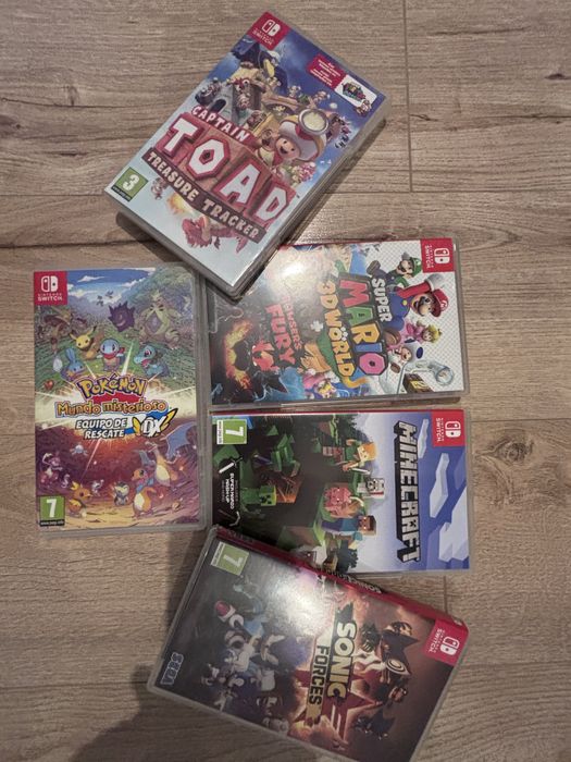 Vand consola Nintendo Switch + 5 jocuri