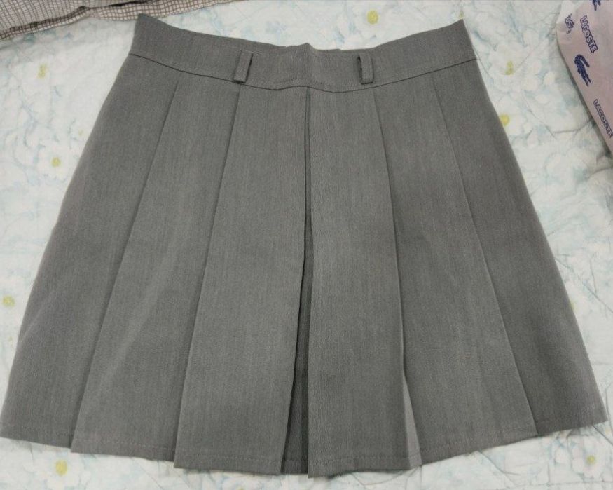 Короткая юбка.  Отлично подходит на весну и  на лето