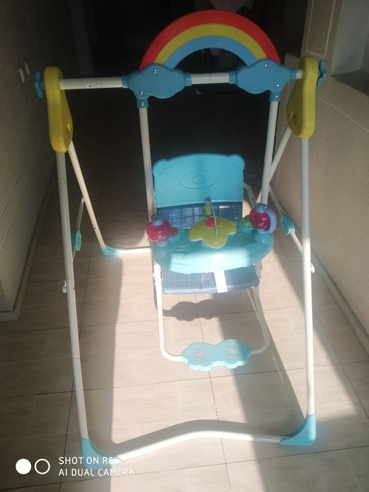 Детский музыкальный качели б/у
