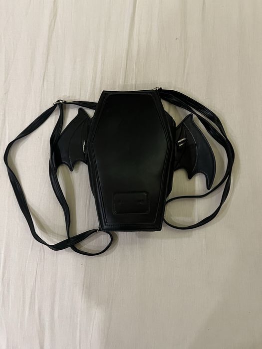 малка чанта с крила