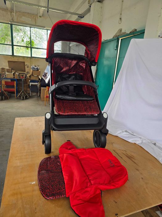 Cărucior compact iCOO Acrobat până la 18 kg , reflectoare, roșu