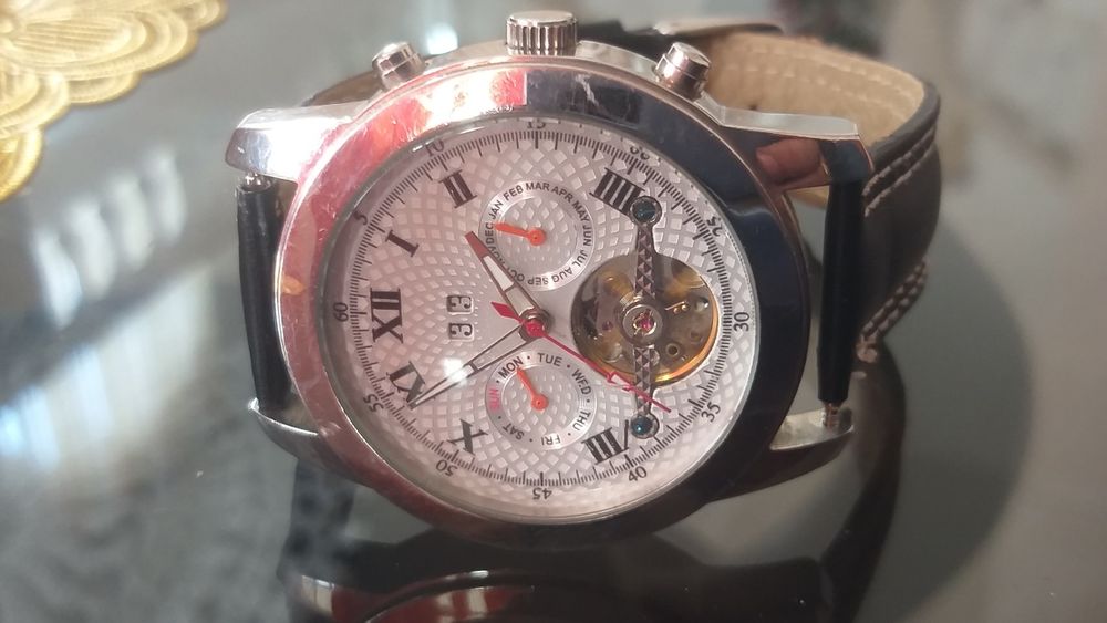 Vand ceas mecanism automatic