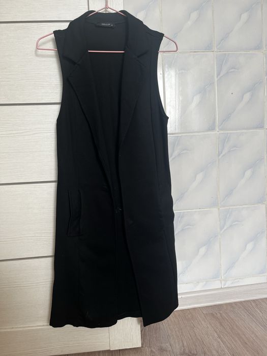 Жилет трикотажный за кг мандаринов