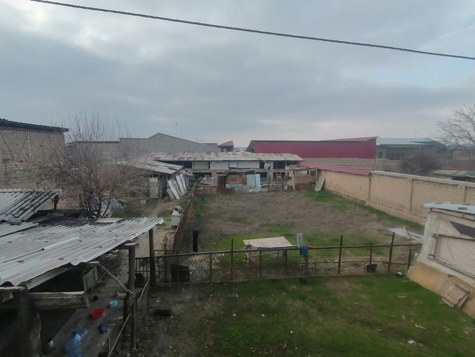 Зангиота район Назарбекда 8 сотих ер сотилади