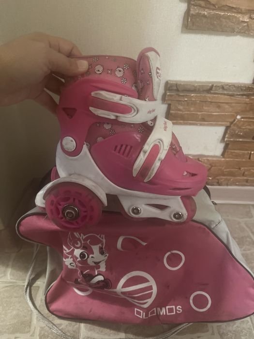 Роликовые коньки