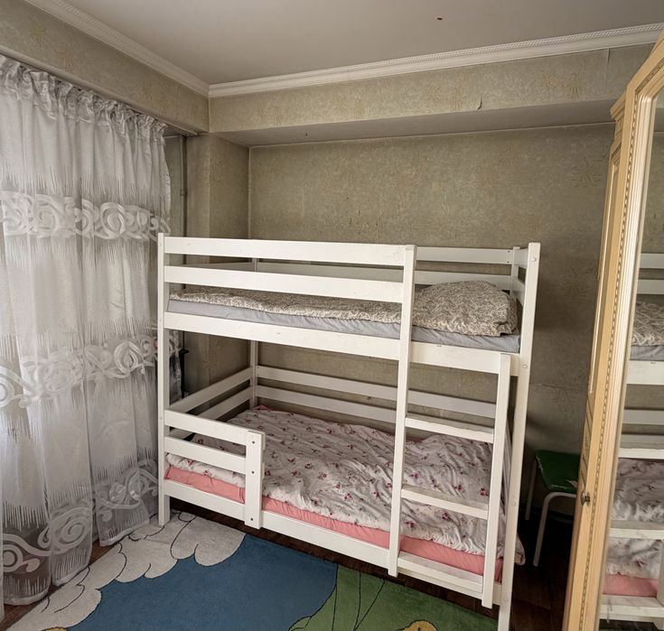 Двухярусная детская кровать