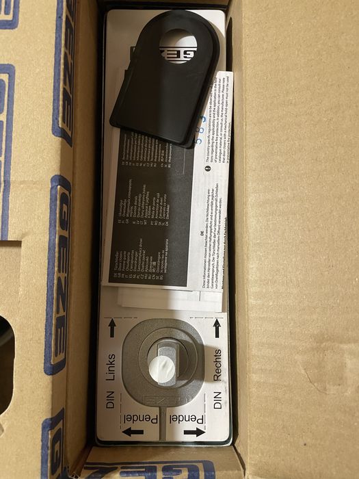 Доводчик Geze для маятниковой двери