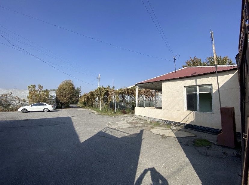 Фаргона шахар Онкология олдида 80 сотих ер сотилади ишлаб чикариш учун