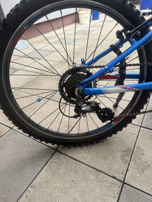 Bicicleta cube copii 7-13 ani