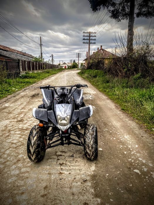 Vând sau schimb  atv de 250cc