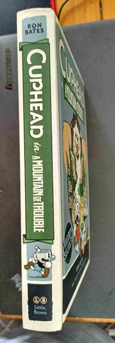 The book of Bill spaniolă și Cuphead engleză