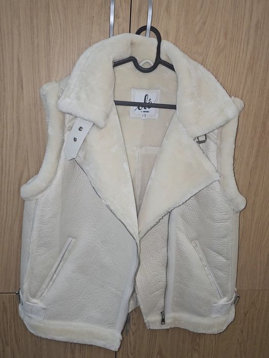 Топъл и модерен елек