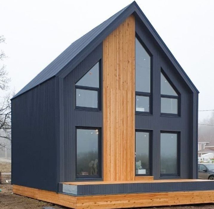 Case pe structura metalica îlvelit cu panou sendwichi