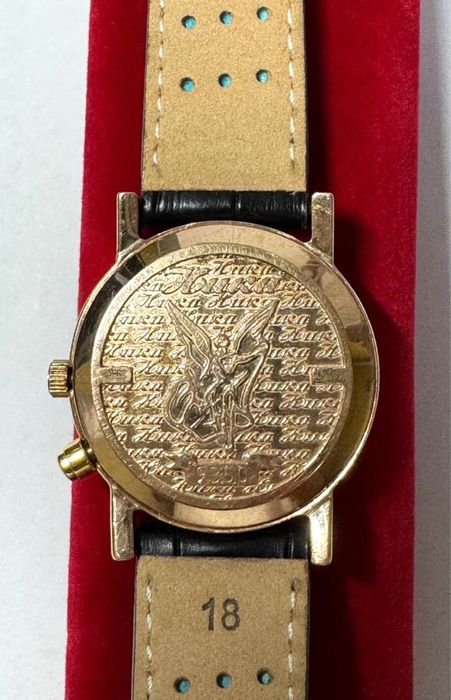 Золотые женские часы