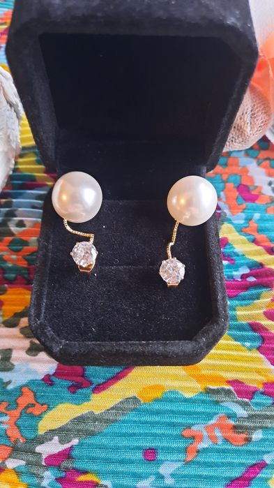 Нови! Продавам сребърни обеци с 14к златно покритие.