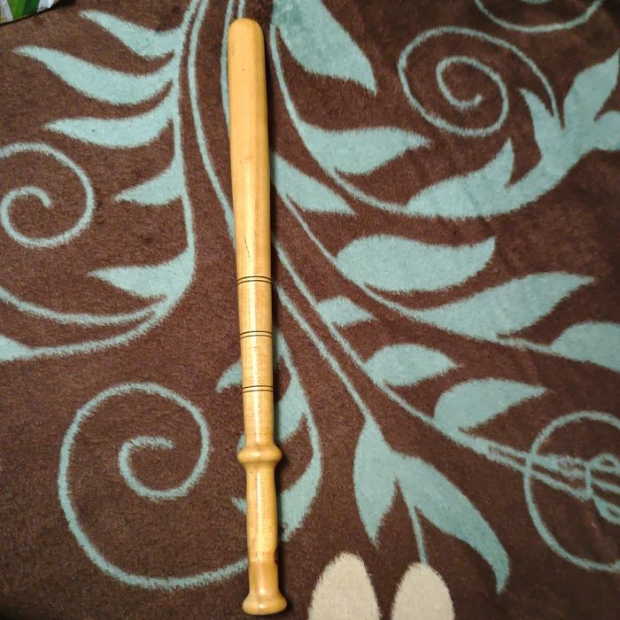 Bata de oina din lemn