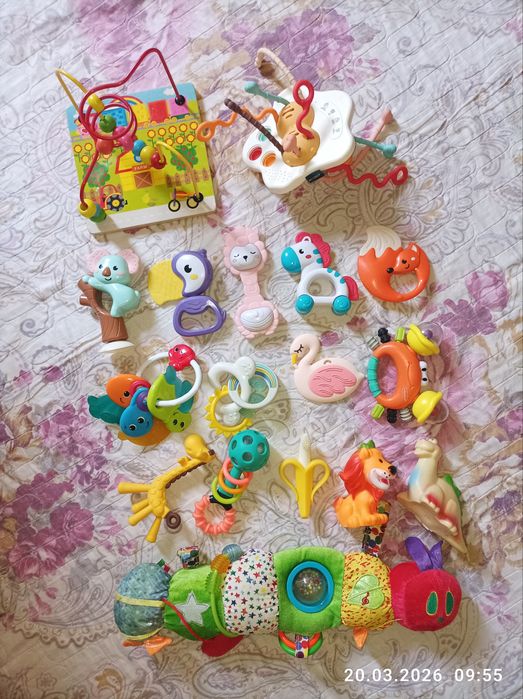 Погремушки,развивающие игрушки